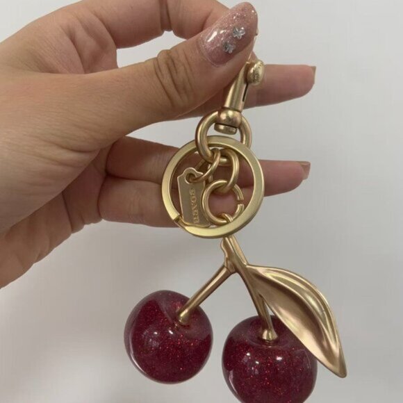 Coach Golden Cherry Keychain - Picture 2 of 5